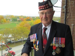 Sarnia's Roy Hare is shown in this file photo on the balcony of his Sarnia apartment. The veteran of the Second World War recently attended the 75th anniversary of the Dieppe Raid in France, as part of a delegation from Canada. Hare was representing his regiment, the Essex Scottish. (Paul Morden/Sarnia Observer)