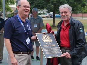 Kiwanis Club president Mike Shimmin, left,  and Mayor Mike Bradley happily dedicate a park pavilion adjacent to the Lochiel Kiwanis Community Centre. (NEIL BOWEN/Sarnia Observer)