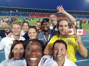 Sudburian Matt Spina, bottom right, poses for a photo with fellow staffers at the 2017 Commonwealth Games in the Bahamas. Photo supplied