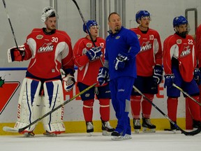 Oil Kings coach Steve Hamilton, shown here directing drills at camp on Monday, says the development of underage players benefits when they can suit up for the team. (Larry Wong)