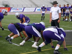 Western Mustang defensive co-ordinator Paul Gleason rotated all his defensive linemen in the season home opener against York on Sunday. (MORRIS LAMONT, The London Free press)