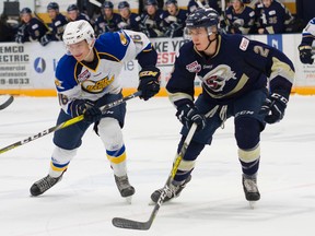 Saints defenceman Jarrod Gurley, right, has committed to Arizona State for the 2018-19 season but will be on the ice for Spruce Grove this season. (Robert Murray)