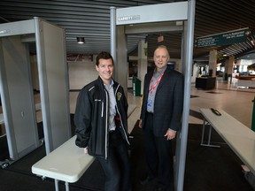 MORRIS LAMONT/THE LONDON FREE PRESS
Rob Simpson, left, general manager of the London Knights, and Brian Ohl, general manager of Budweiser Gardens, show the new metal detectors fans will have to pass through at each gate.