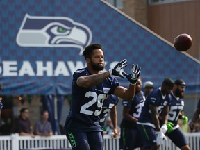 Seattle Seahawks free safety Earl Thomas makes a catch during an NFL football training camp on Aug. 10, 2017, in Renton, Wash. (AP Photo/Ted S. Warren)