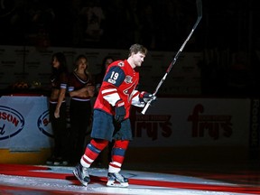 Coyotes forward Shane Doan acknowledges the crowd during a ceremony honouring him for his 400th NHL goal and his 1500th NHL game played prior to a game against the Islanders on Jan. 7, 2017, in Glendale, Ariz. Doan has announced his retirement in a letter to fans in Phoenix. (Ross D. Franklin/AP Photo)