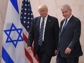 US President Donald Trump arrives at the Israel Museum to speak in Jerusalem on May 23, 2017, accompanied by Israeli Prime Minister Benjamin Netanyahu. (Mandel Ngan/Getty Images)