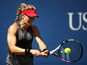 Eugenie Bouchard returns a shot to Evgeniya Rodina after their first round Women's Singles match on Day 3 of the US Open at the USTA Billie Jean King National Tennis Center on Aug. 30, 2017. (Clive Brunskill/Getty Images)