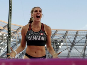Canada's Alysha Newman celebrates after an attempt in the women's pole vault final during the World Athletics Championships in London Aug. 6, 2017. (AP Photo/Matt Dunham)