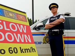 RCMP Inspector Steve Daley (Officer in Charge, Alberta Traffic Services) urges motorists to slow down when passing emergency workers and other roadside workers. (PHOTO BY LARRY WONG/POSTMEDIA)