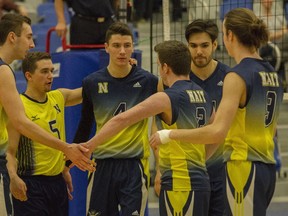 The NAIT Ooks celebrate a point against the Keyano Huskies during ACAC men's volleyball action at the Syncrude Sport and Wellness Centre in Fort McMurray Alta. on Friday January 20, 2017.
