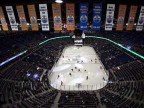 Vancouver Canucks and the Edmonton Oilers warm up before first period NHL action in Edmonton, Alta., on April 6, 2016. (THE CANADIAN PRESS/Jason Franson)