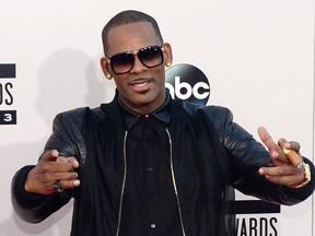 R. Kelly arrives for the 2013 American Music Awards at the Nokia Theatre L.A. Live in downtown Los Angeles, California, November 24, 2013. (FREDERIC J. BROWN/AFP/Getty Images)