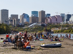 People enjoy a hot summer day on "Accidental Beach" in Edmonton on Tuesday, August 29, 2017. Codie McLachlan/Postmedia