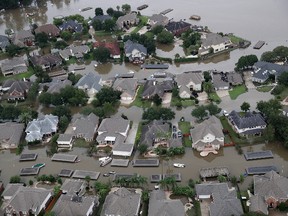 HOUSTON, TX - AUGUST 30:  Flooded homes are shown near Lake Houston following Hurricane Harvey August 29, 2017 in Houston, Texas. The city of Houston is still experiencing severe flooding in some areas due to the accumulation of historic levels of rainfall, though the storm has moved to the north and east.  (Photo by Win McNamee/Getty Images)