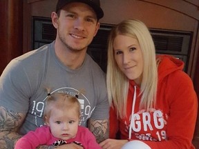 Chris Godfrey of Courtenay, B.C. is seen with his wife and young daughter. Godfrey sustained a head injury during a softball game on August 19, 2017 and later died at Victoria General Hostpial. (GoFundMe/Nicole Lebrun)