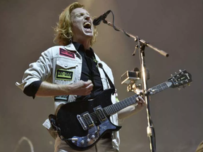 Richard Reed Parry of Arcade Fire performs on Day 4 at Lollapalooza in Grant Park on Sunday, Aug 6, 2017, in Chicago. (ROB GRABOWSKI / INVISION/AP)