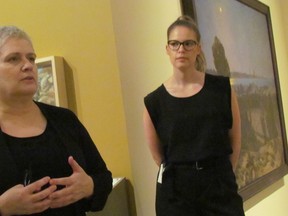 Curator Lisa Daniels, left, and assistant curator Sonya Blazek are shown Thursday at the Judith and Norman Alix Art Gallery in Sarnia, Ont., where the exhibitions Witness, Canadian Art of the First World War, and Lambton At War are set to open during this week's First Friday, 6 p.m. to 9 p.m.