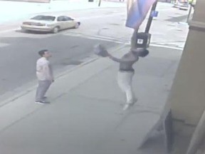 Aeolian Hall released surveillance footage showing a man steal a rainbow flag from outside the Dundas Street venue and put it down a sewer.