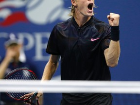 Denis Shapovalov celebrates during the second set of his match against Jo-Wilfried Tsonga, of France, at the U.S. Open in New York Wednesday. (AP Photo/Kathy Willens)