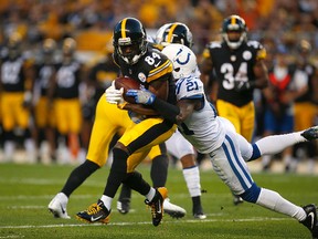 Antonio Brown of the Pittsburgh Steelers is tackled by Vontae Davis of the Indianapolis Colts during a pre-season game on Aug. 26, 2017. (Justin K. Aller/Getty Images)