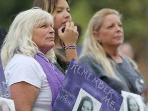From the left; Carol Ward, Tia Erickson, and Becky Ball were among the group that assembled at The Legislative Building, in Winnipeg. The gathering marked International Overdose Awareness Day, Thursday, August 31, 2017. Chris Procaylo/Winnipeg Sun/Postmedia Network