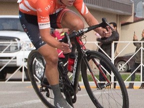 Evan Huffman rounds a corner during Stage 3 of the 2016 Tour of Alberta, Sept. 3, 2016, in Spruce Grove. (Jason Franson/The Canadian Press)