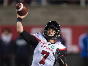 Ottawa Redblacks quarterback Trevor Harris fires a pass as they face the Montreal Alouettes during third quarter CFL action on Aug. 31, 2017 in Montreal. (THE CANADIAN PRESS/Paul Chiasson)