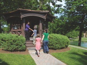 A guide welcomes visitors to Mark Twain's study on the campus of Elmira Cottage. The writing studio was originally built at Quarry Farm, where Twain and his wife Olivia spent their summers. (FINGERLAKESTOURISM.ORG PHOTO)