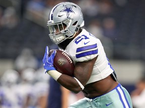 Ezekiel Elliott of the Dallas Cowboys carries the ball during the warm-up before a preseason game against the Indianapolis Colts at AT&T Stadium on August 19, 2017 in Arlington. (Tom Pennington/Getty Images)