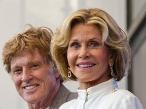 Actor Robert Redford, left, and Jane Fonda pose during the photo call for the film "Our Souls At NIght" at the 74th Venice Film Festival in Venice, Italy, Friday, Sept. 1, 2017. (AP Photo/Domenico Stinellis)