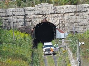 A CN truck is shown near the opening of the opening of the now closed original railroad tunnel in Sarnia, next to an area of city once known as the south ward. What was once a busy city neighbhourhood is believed to have originated as the home of workers who built the tunnel in the late 1800s. A reunion for the south ward is being held Sept. 12, at the Royal Canadian Legion in Sarnia.
Paul Morden/Sarnia Observer/Postmedia Network