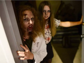 Sarah Ansell, left, and Emma Park were two of the undead at the Diefenbunker in 2015. (James Park, Postmedia)