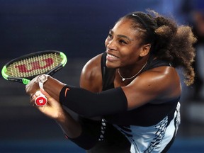 In this Saturday, Jan. 28, 2017 file photo, Serena Williams makes a backhand return to her sister Venus at the Australian Open in Melbourne. (AP Photo/Aaron Favila, File)