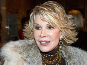 Television personality Joan Rivers arrives for the Banana Republic 2005 Spring Collection at the New York Public Library October 25, 2004 in New York City. (Photo by Astrid Stawiarz/Getty Images)