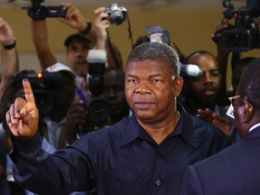Joao Lourenco shows his ink-stained finger after casting his vote in Luanda, Angola, on Aug. 23. Lourenco, Angola?s MPLA candidate and defence minister, won the presidency to succeed President Jose Eduardo dos Santos, who stepped down after 38 years leading the oil-producing nation, which has struggled since oil prices collapsed in 2014. Bruno Fonseca/AP Photo