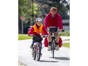 James Potvin, 9, completes a ride for autism with his father, Chris, on Friday, Sept 1, 2017. They biked more than 400 kilometres from Whitby, Ont., to Ottawa during the past week.