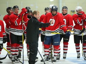 67’s assistant coach Mario Duhamel talks to the players during training camp this week. (JEAN LEVAC/Postmedia Network)