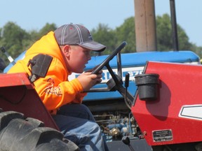 Kyle Ross, 10, from Wabash, Ont., leans into the competition Saturday, Sept. 2, 2017 at the Lambton County Plowing Match held in Dawn-Euphemia Township.
 Paul Morden/Sarnia Observer/Postmedia Network