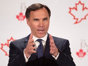 Finance Minister Bill Morneau addresses The Canadian Club of Toronto and The Empire Club regarding Budget 2017 in Toronto on Friday March 24, 2017. THE CANADIAN PRESS/Frank Gunn