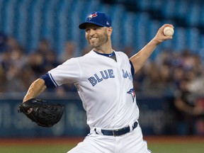 Toronto Blue Jays pitcher J.A Happ throws against the Boston Red Sox in Toronto on Wednesday, August 30, 2017. (THE CANADIAN PRESS/Fred Thornhill)