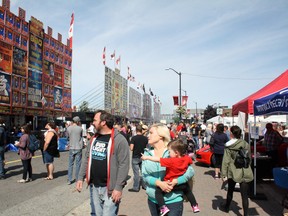 Locals line up for lunch during Downtown Sudbury Ribfest 2017. Ben Leeson/The Sudbury Star/Postmedia Network