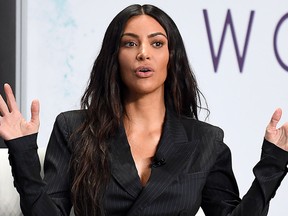 Kim Kardashian speaks on stage with Steve Forbes at the 2017 Forbes Women's Summit at Spring Studios on June 13, 2017 in New York City.  (ANGELA WEISS/AFP/Getty Images)