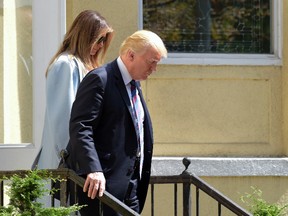 President Donald Trump and first lady Melania Trump leave after attending services at St. John's Church in Washington, Sunday, Sept. 3, 2017. (AP Photo/Susan Walsh)