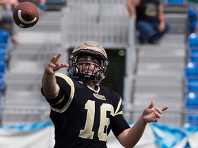 Edmonton Huskies quarterback Brad Launhardt threw two touchdown passes in a 33-0 win against the Edmonton Wildcats on Saturday at Clarke Stadium.