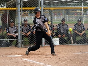 New Hamburg Mustangs and Embro local Matt Zilke, right makes contact with a pitch during the ISC Canada East qualifier earlier this summer. The Mustangs won their second consecutive under-21 ISC title. Greg Colgan/Woodstock Sentinel-Review/Postmedia Network file photo