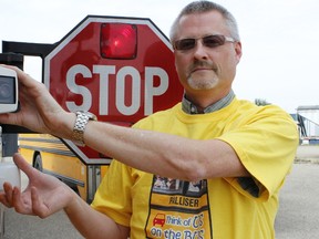 Palliser Transportation Services Supervisor David Shaw with one of Palliser's bus cameras. Palliser file photo