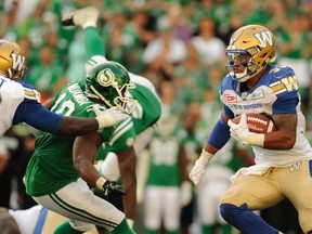 Winnipeg Blue Bombers running back Andrew Harris works his way upfield during second half CFL action against the Saskatchewan Roughriders, in Regina on Sunday, September 3, 2017. THE CANADIAN PRESS/Mark Taylor