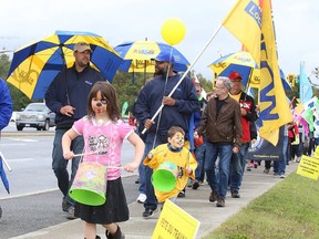 Participants march along Paris Street during the Sudbury and District Labour Council's Labour Day festival on Monday. The labour council is celebrating its 60th anniversary in 2017. (Gino Donato/Sudbury Star)