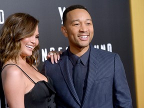 Chrissy Teigen (L) and actor/singer/executive producer John Legend attend WGN America's 'Underground' Season Two Premiere Screening at Regency Village Theatre on March 1, 2017 in Westwood, California. (Photo by Charley Gallay/Getty Images for WGN America)