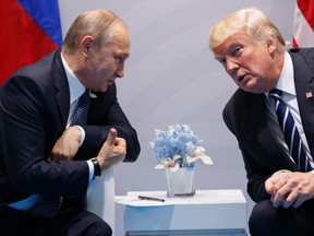 In this July 7, 2017 file photo, President Donald Trump meets with Russian President Vladimir Putin at the G20 Summit in Hamburg. (AP Photo/Evan Vucci, File)